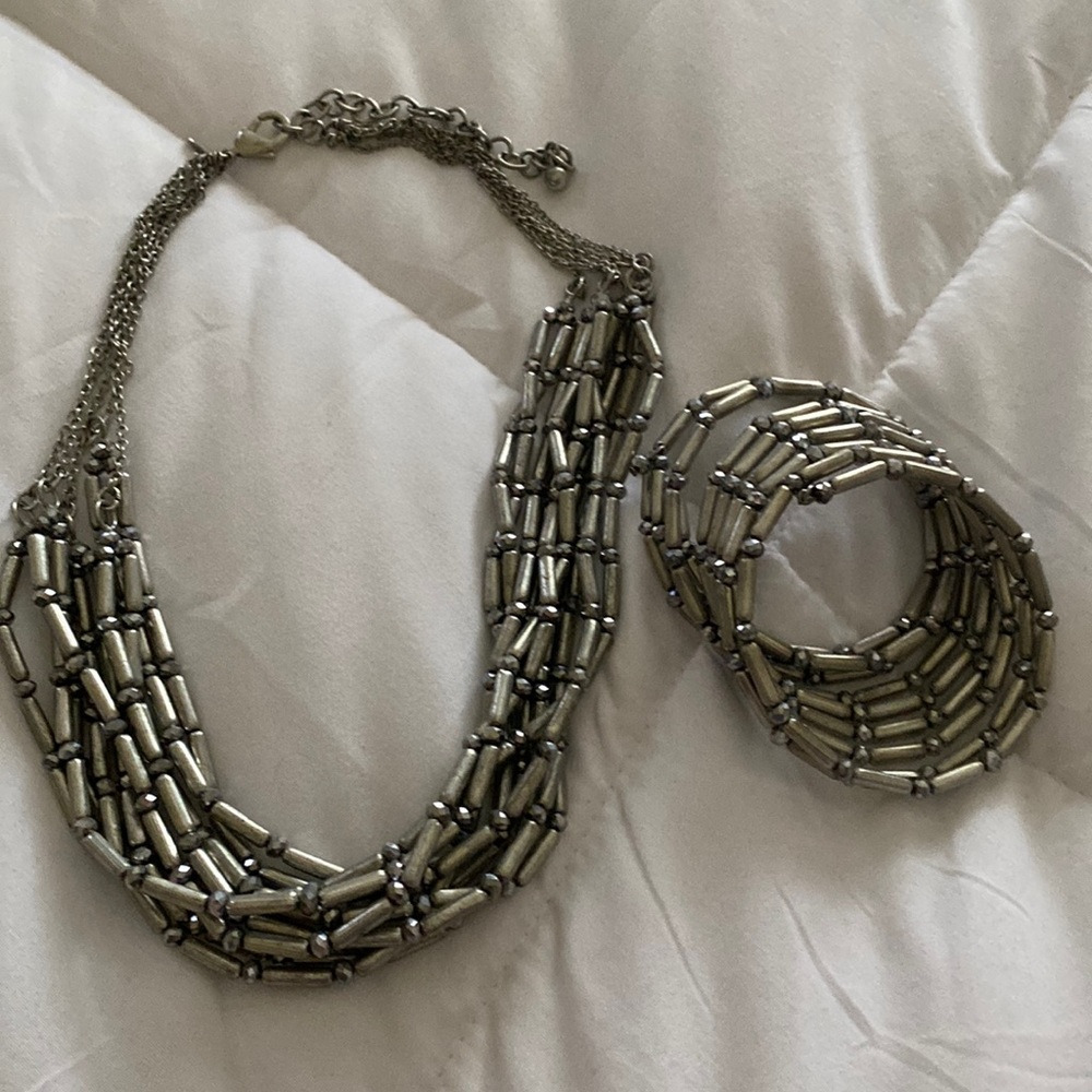 Chico’s silver beaded bib necklace & bracelet set.